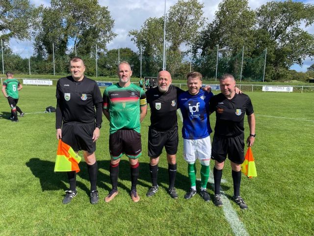 Team captains with officials