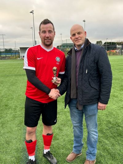 Buckley Cup 'Man of the Match' Stevie Lawson receiving his trophy from League President Gary Busch