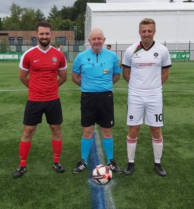 Buckley final referee with both captains