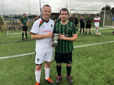 Ciaran Taylor receiving his Forsythe Cup 'Man of the Match' trophy from Andy Forsythe